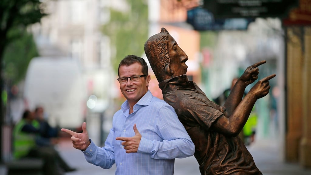Paul Howard with the Ross O’Carroll-Kelly statue in Dublin city centre. Photograph Nick Bradshaw