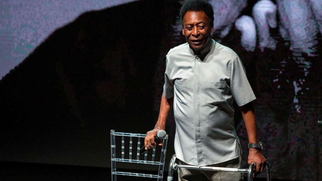 Pele used a walking frame to stand on stage during the opening event of the 2018 Carioca Football Championship in Rio de Janeiro on Monday. Photograph: Mauro Pimentel/AFP/Getty Images
