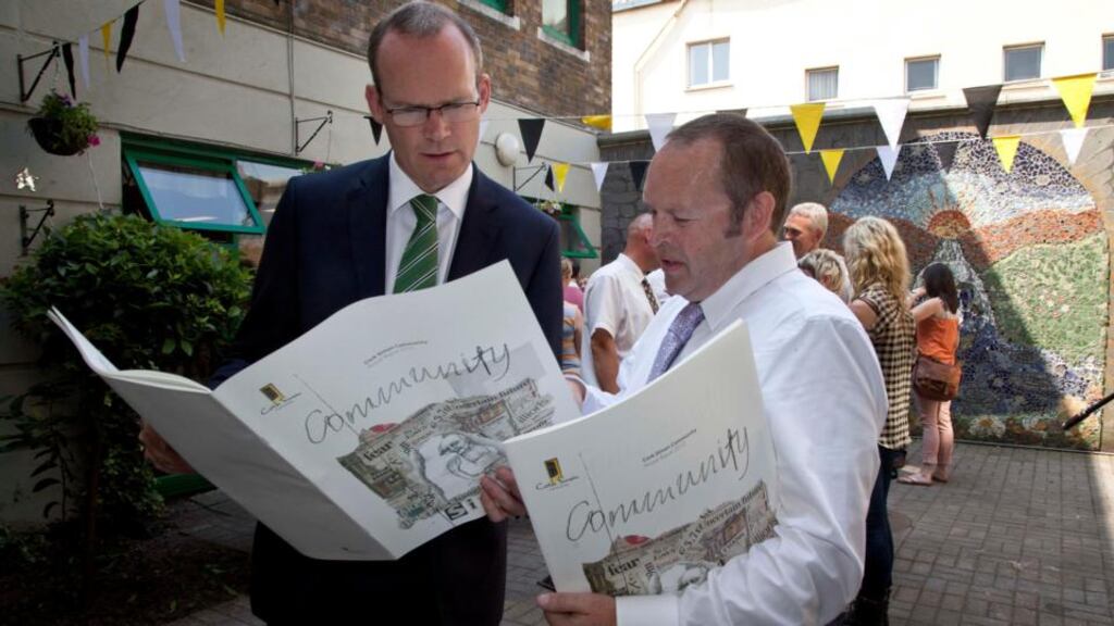 Cork Simon chief executive Dermot Kavanagh  speaking with Minister for Agriculture, Food and the Marine Simon Coveney at the launch of the community’s annual report for 2012, which   warns there’s little hope Government policy on homelessness will work if current levels of funding are not maintained. Photograph:  Clare Keogh