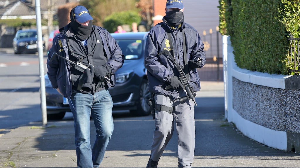 Gardaí from the Special Detective Unit and members of the Criminal Assets Bureau raided houses of suspected drug dealers in Raleigh Square, Crumlin. Photograph: Colin Keegan/Collins