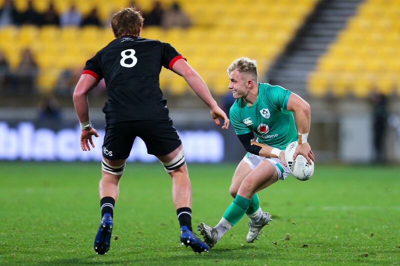 Craig Casey of Ireland passes during the match against New Zealand Maori All Blacks. Photograph: Hagen Hopkins/Getty