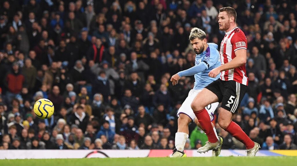 Sergio Aguero of Manchester City scores his side’s first goal during the Premier League win over Sheffield United. Photo: Michael Regan/Getty Images