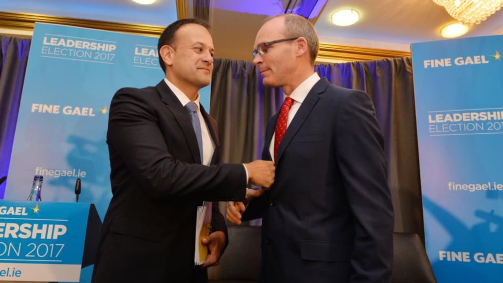 Fine Gael Leadership Candidates Leo Varadkar and Simon Coveney at the start of the first of four campaign hustings, at the Red Cow Hotel in Dublin on Thursday. Photograph: Alan Betson