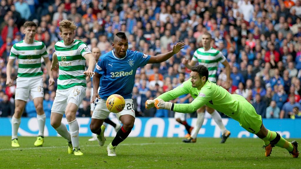 Celtic’s keeper Craig Gordon punches the ball away during the Scottish Premiership match at the Ibrox Stadium, Glasgow. Photograph: Jane Barlow/PA