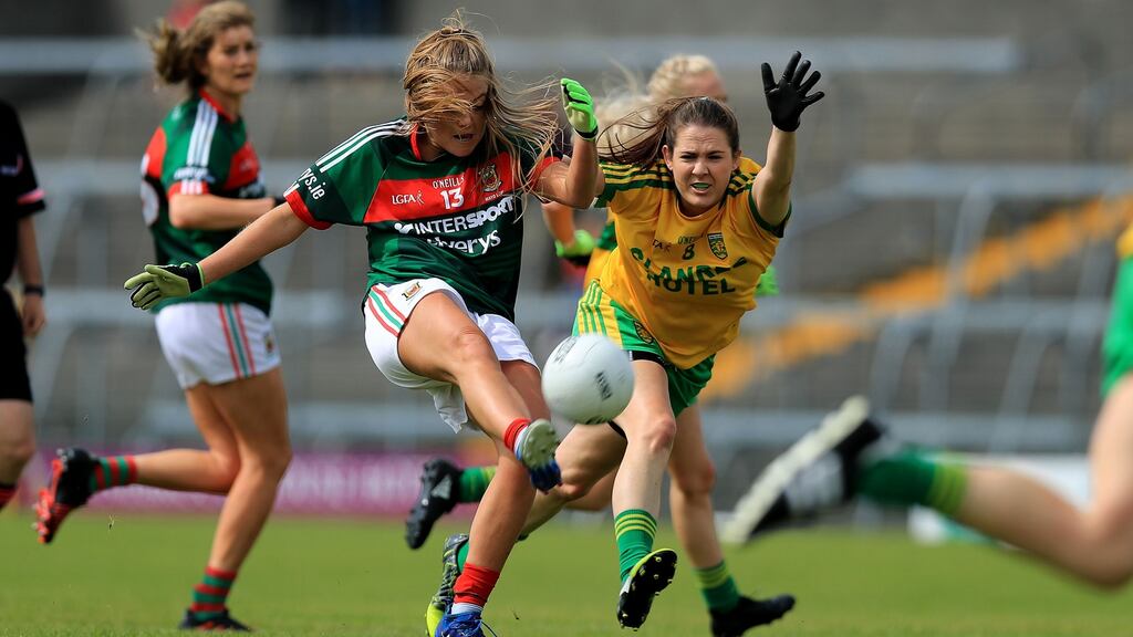 Donegal’s Katy Herron tries to block Sarah Rowe of Mayo. Photograph: Donall Farmer/Inpho