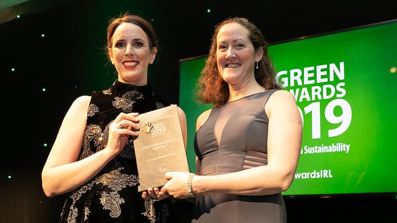 Mary Frances Rochford, Programme Manager, Office of Environmental Sustainability, Environmental Protection Agency presents the Green Small Organisation of the Year award to Alice Ryan, Irish Green Building Council.