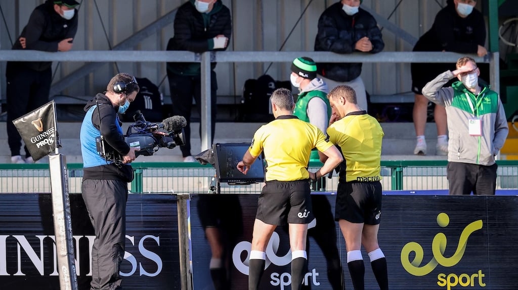 Referee Frank Murphy and assistant referee Andrew Brace review a decision during the Connacht v Leinster Guinness Pro 14 Rainbow Cup game at The Sportsground. Photograph: Bryan Keane/Inpho