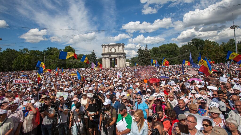 Citizens protest in Great National Assembly Square, in front of the Arch of Triumph, after the invalidation of the second round of mayoral elections in Chisinau, Moldova, on Monday. Photograph: Dumitru Doru/EPA