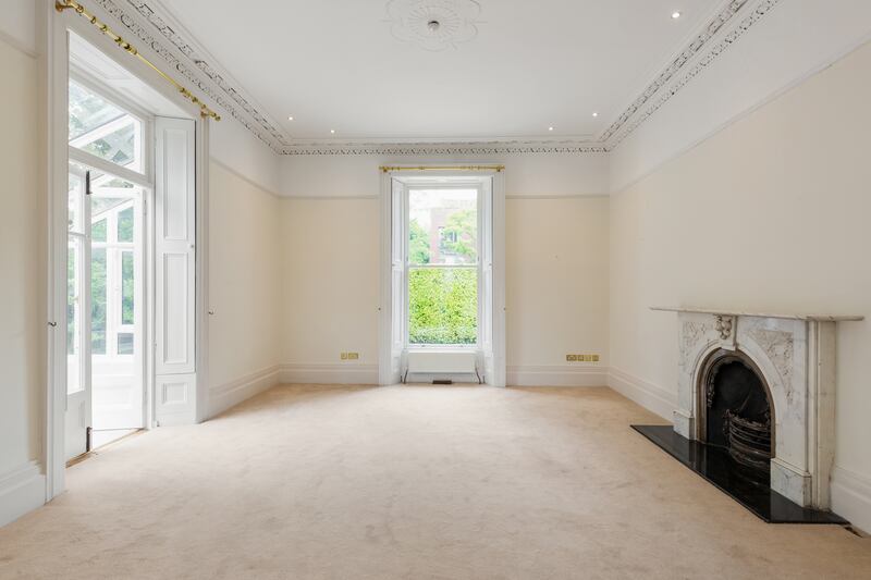 Drawing room with door to sunroom on the left.