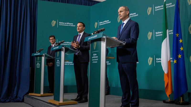 From left: Minister Eamon Ryan, Tánaiste Leo Varadkar and  Taoiseach Micheál Martin at this evening’s briefing. Photograph: Julien Behal
