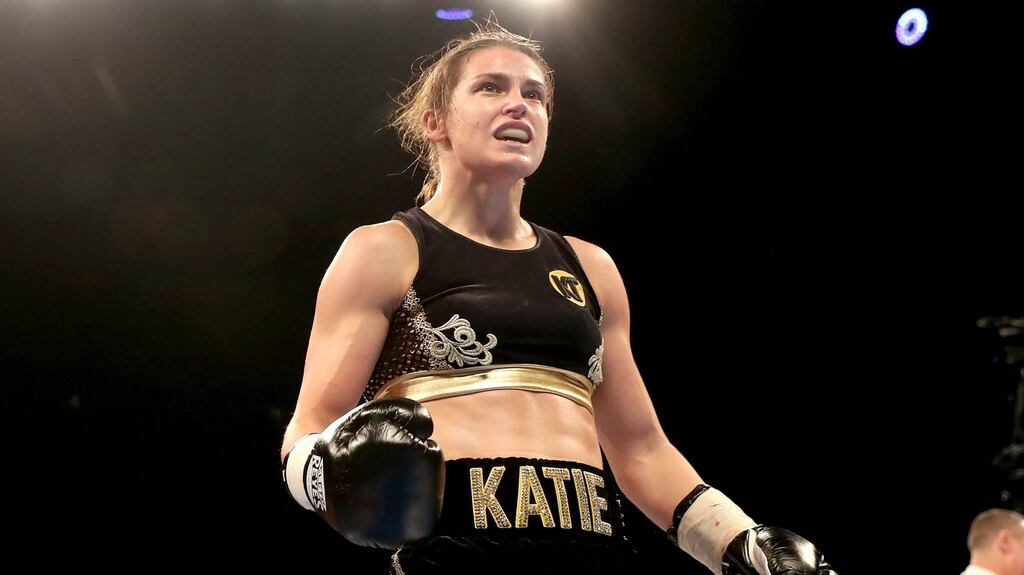 Katie Taylor celebrates her win at the SSE Arena in Wembley over the weekend. Photograph: Ryan Byrne/Inpho
