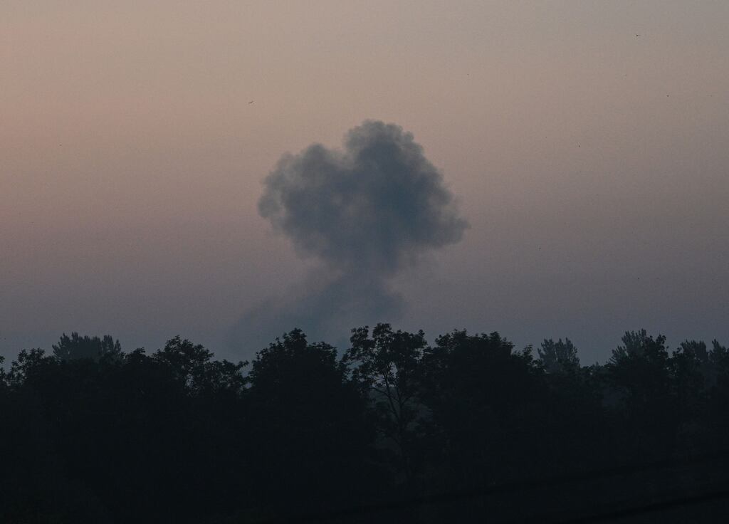 A cloud of smoke rises after a night drone strike in the western Ukrainian city of Lviv amid Russia's military invasion on Ukraine. Photograph: Yuriy Dyachyshy/AFP via Getty Images