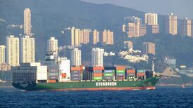 Asian shares edge up as markets digest China trade data