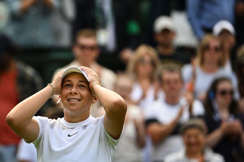 Amanda Anisimova of the United States celebrates after beating compatriot Coco Gauff during their women's singles match at Wimbledon. Photograph: Sebastien Bozon/AFP via Getty Images