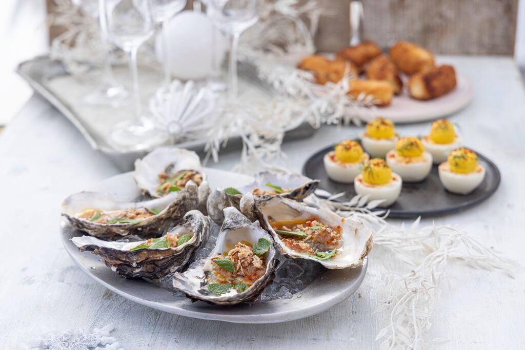 Oysters wth Vietnamese dressing; devilled eggs; and croquettes. Photograph: Harry Weir