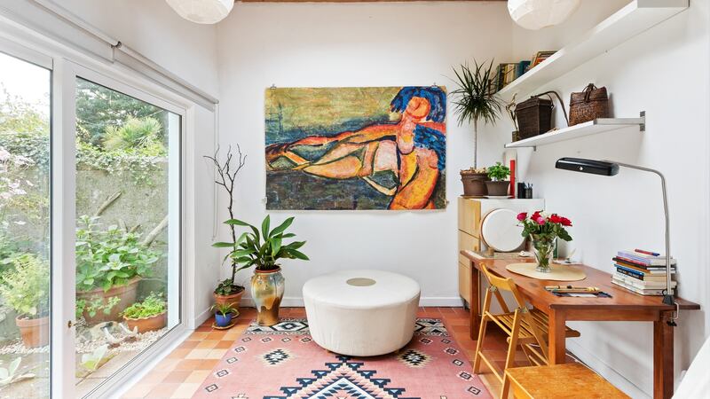 Sunroom opening to garden