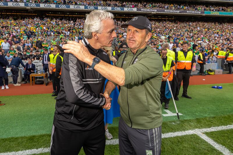 Kerry manager Jack O'Connor commiserates with Donegal manager Jim McGuinness. Photograph: Morgan Treacy/Inpho