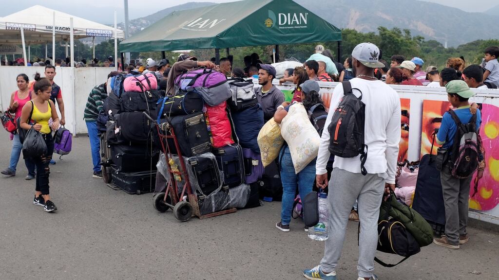 The Colombian-Venezuelan border in Cúcuta, Colombia. “There is a lot more military activity now on the Venezuelan side of the border,” says Abel López, who has a ringside view of the standoff from the rice farm he manages.  Photograph:   Marco Bello/Reuters