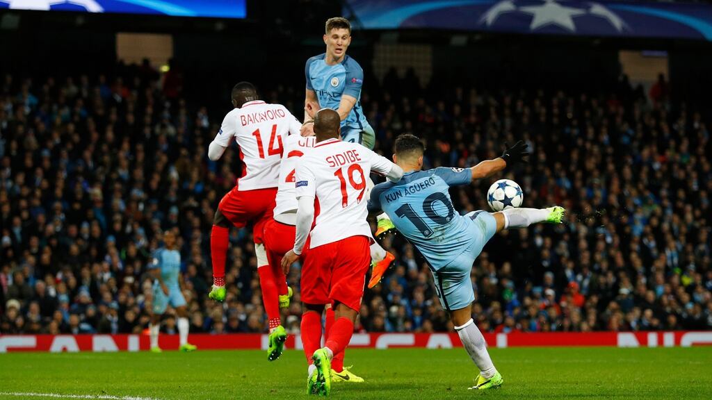 Manchester City’s Sergio Agüero scores their third goal in the Uefa Champions League round of 16 first-leg match against Monaco at Etihad Stadium. Photograph: Phil Noble/Reuters/Livepic