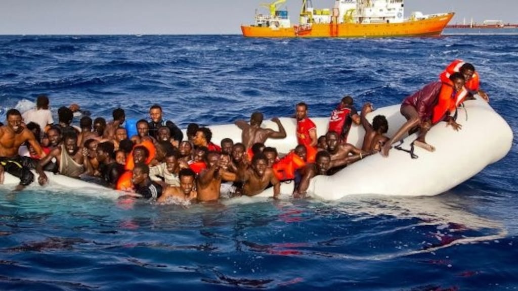 Migrants in a dinghy boat ask for help off the coast of the Italian island of Lampedusa. File photograph: Patrick Bar/SOS Mediterranee via AP