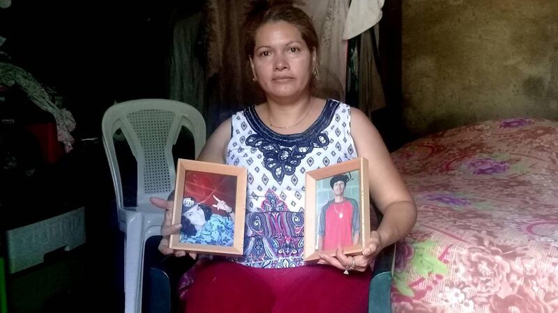 Iris Parrales, at her Managua home, with pictures of her son Noel Calderón and her husband Humberto, both killed in May 2018. Photograph: Michael McCaughan