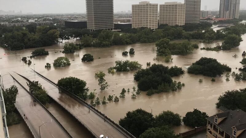 The flooded downtown area of Houston is seen from a high-rise building along Buffalo Bayou after Hurricane Harvey inundated the Texas Gulf coast with rain, causing widespread flooding. Photograph: Twitter/@caroleenarn/Reuters