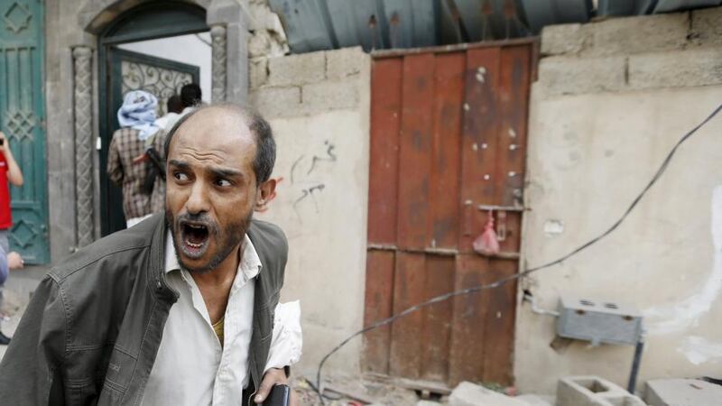 A man reacts after a Saudi Arabian airstrike hits the Yemeni capital Sana’a. Photograph: Khaled Abdullah/Reuters.