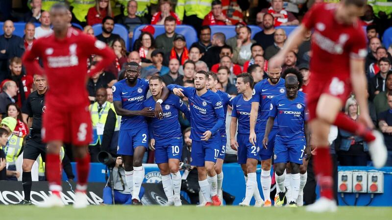 Chelsea’s Eden Hazard celebrates scoring with his team-mates in the Premier League game at Stamford Bridge. Photograph: David Klein/Reuters