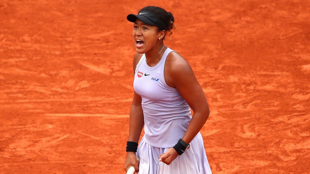 Naomi Osaka is into the third round at Roland Garros after victory over Victoria Azarenka. Photograph: Clive Brunskill/Getty