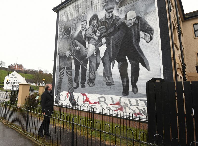 Archbishop Eamon Martin at a mural in the Bogside depicting an event of Bloody Sunday on January 30th, 1972. Photograph: Trevor McBride