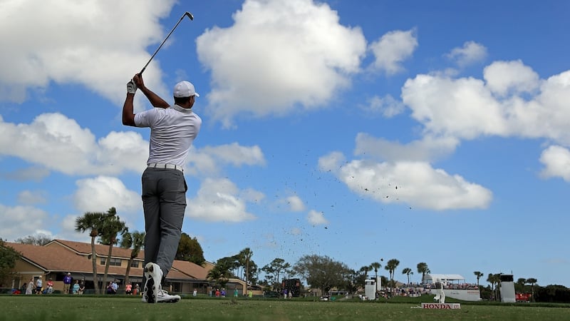 Tiger Woods plays a tee shot during the pro-am for the Honda Classic in Palm Beach Gardens, Florida. Photograph: Mike Ehrmann/Getty Images