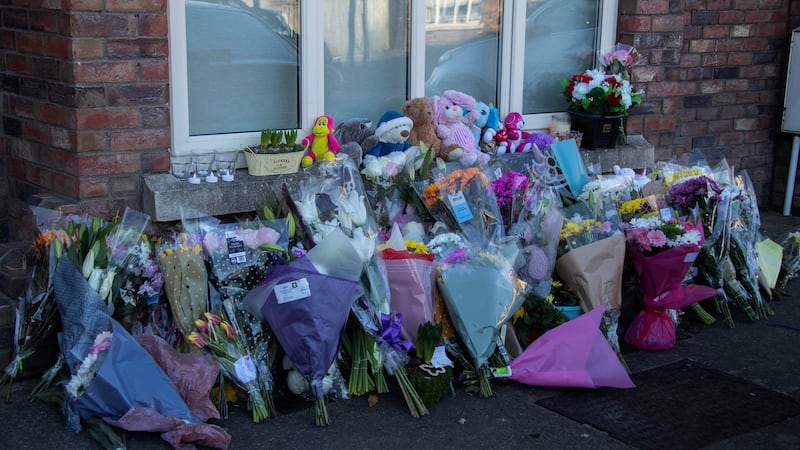 Flowers are seen outside the McGinley family’s home in Newcastle, Co Dublin on Monday. Photograph: Colin Keegan/Collins.