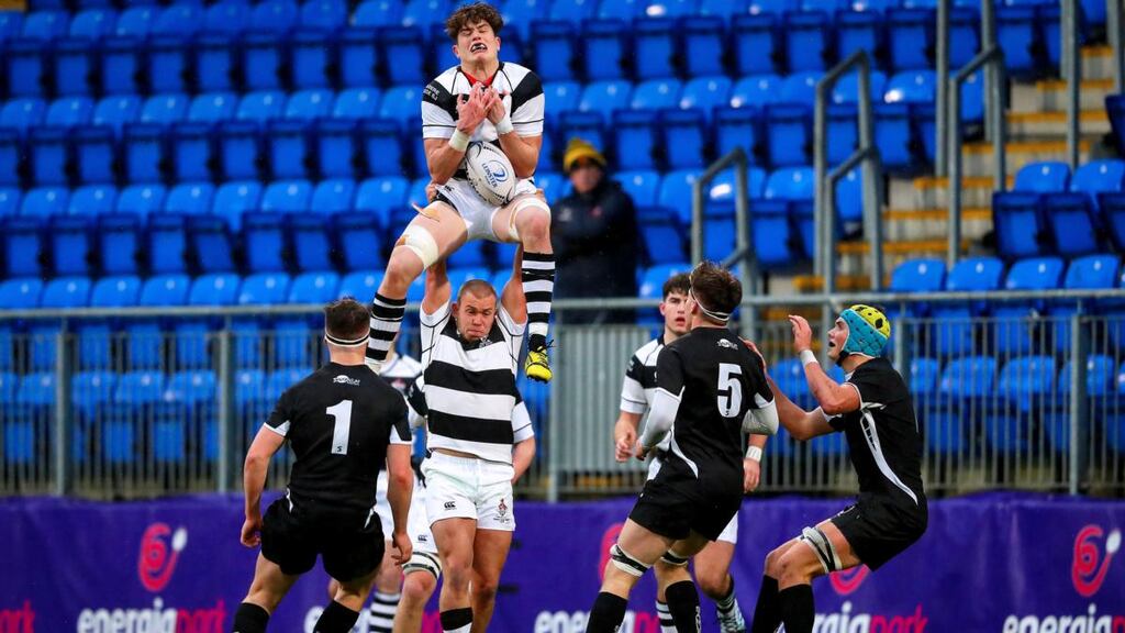Belvedere’s Conor Kelly holds up Alekseiy Soroka during the Bank of Ireland Leinster Schools Senior Cup first-round game against Cistercian College Roscrea at  Donnybrook. Photograph: Tommy Dickson/Inpho