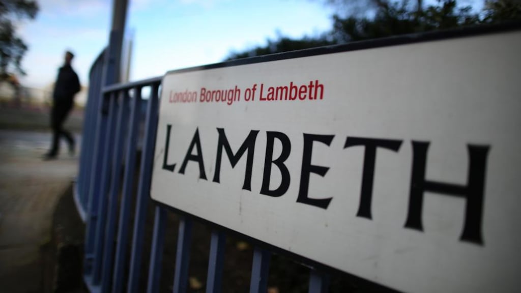 A man walks near a road sign in Lambeth, London, today.  British police have reported that three women who have allegedly been held for 30 years as slaves in a house in the Lambeth area of south London have been freed. Photograph:  Peter Macdiarmid/Getty Images