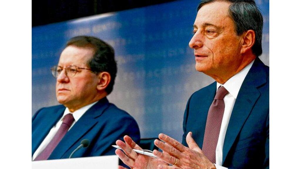 ECB vice-president Vitor Constancio with bank president Mario Draghi as he answers questions during a news conference yesterday. photograph: bloomberg