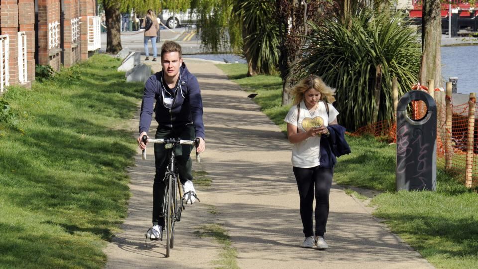 Cyclists and pedestrians share space on the Grand Canal. Photograph: Dave Meehan