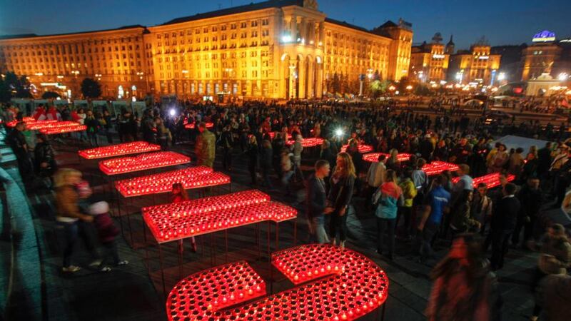 Rally: candles burn in Independence Square in Kiev, to form the words “Glory to Ukraine, Glory to Heroes!”, during a rally to show support for servicemen on the frontline in eastern Ukraine. Photograph: Valentyn Ogirenko/Reuters