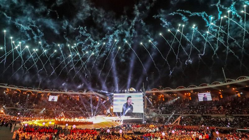 Fireworks surround the Zayed Sports City Stadium in Abu Dhabi. Photograph: Karim Sahib/AFP/Getty Images