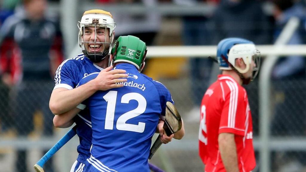 Clare All Star Conor McGrath and Sean Collins celebrate after last week’s hurling final victory over Crusheen. Both players will be in action in the football final against Éire Óg as Cratloe aim to complet the double. Photo: James Crombie /Inpho