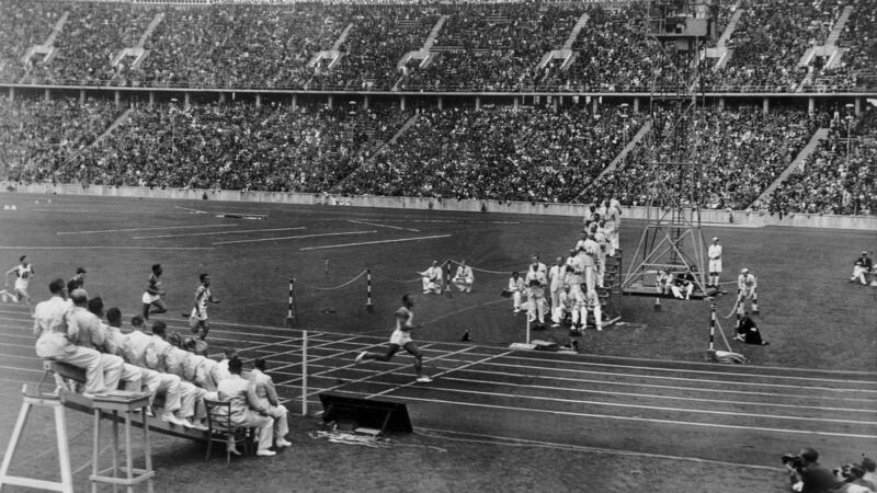 Jesse Owens breaks the 100m world record in the Olympic Stadium at the Berlin Olympics. File photograph: Getty Images