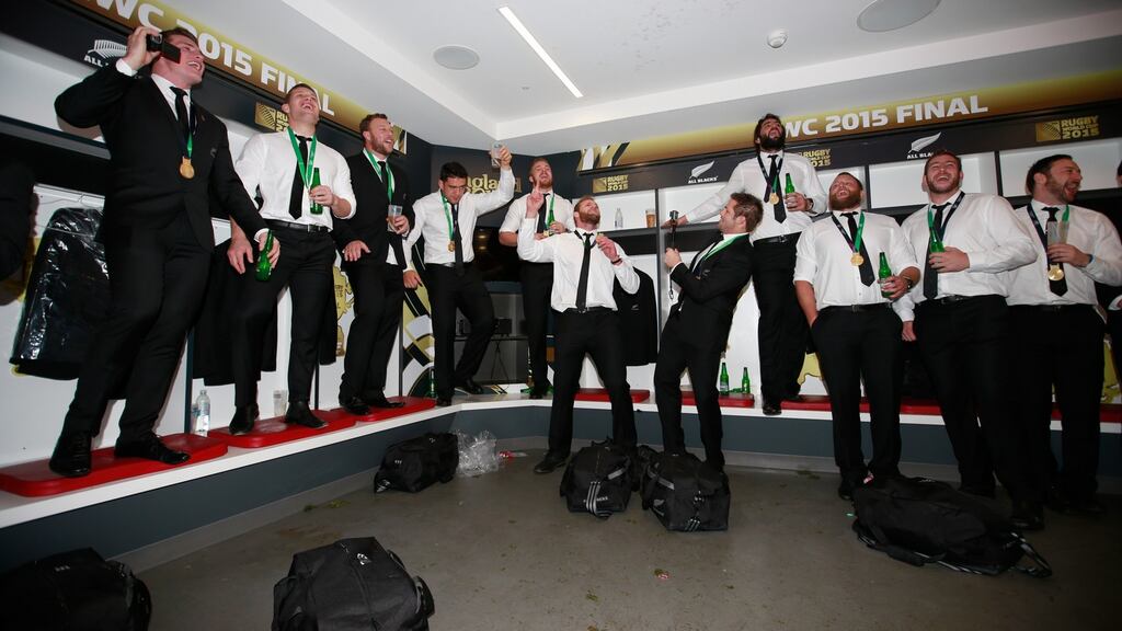 The All Blacks enjoy a singsong in their dressingroom after winning the Rugby World Cup final 34-17 against Australia at Twickenham on Saturday. Photograph: Phil Walter/Getty Images