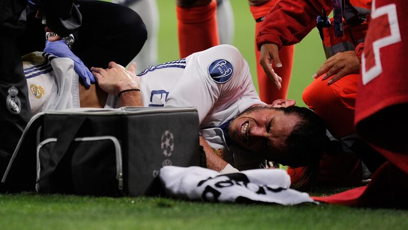 Real Madrid winger Gareth Bale lies injured on the ground. Since arriving at the club in the summer of 2013 for €100 million, he’s been hamstrung by injuries, 20 in total. Photograph: Denis Doyle/Getty Images