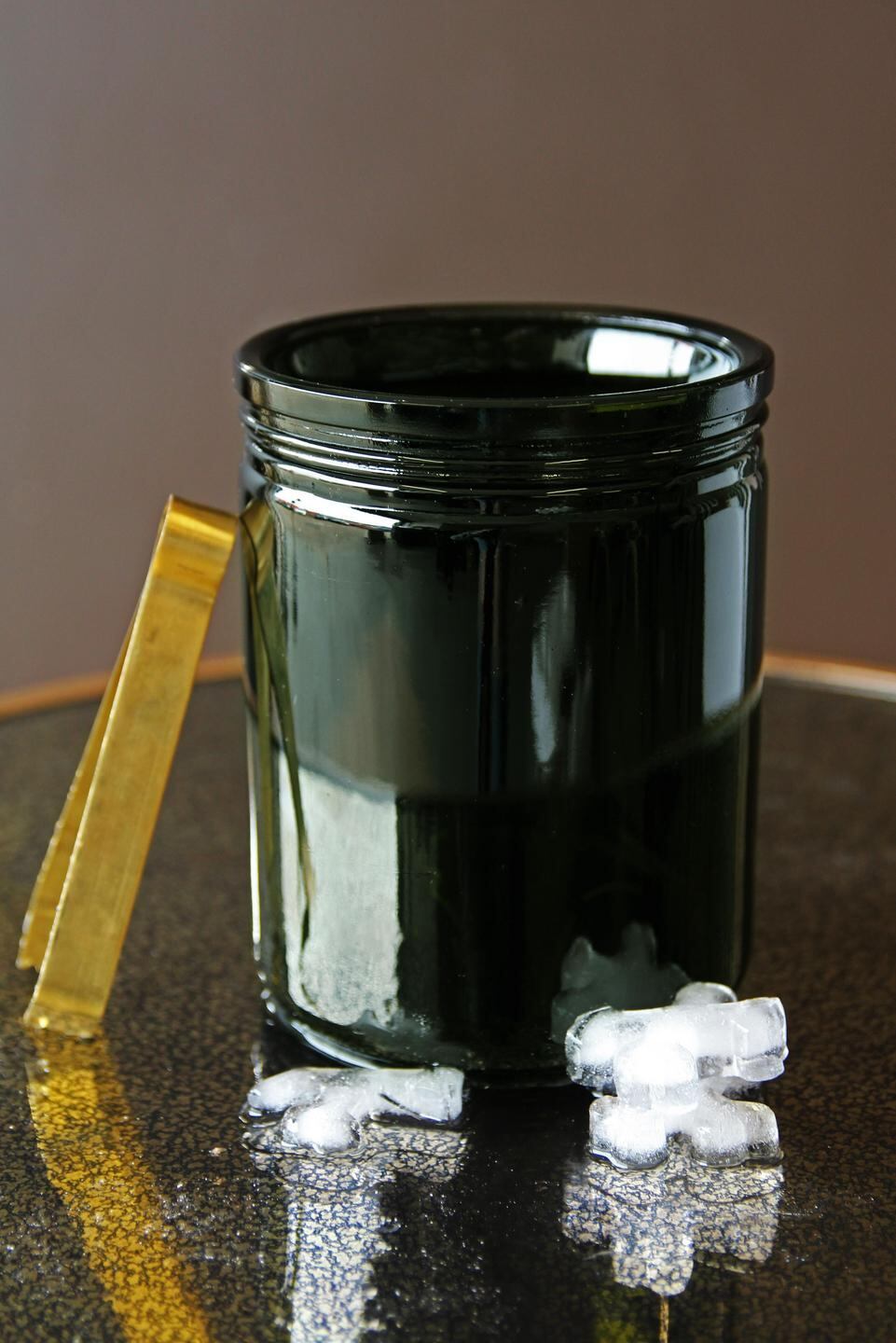 This green ceramic design by Rockett St George is ideal for use as a ice bucket.