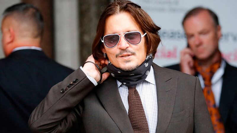 US actor Johnny Depp arrives to attend the seven day of his libel trial against News Group Newspapers (NGN), at the High Court in London, on Wednesday. Photograph: Tolga Akmen/AFP via Getty Images