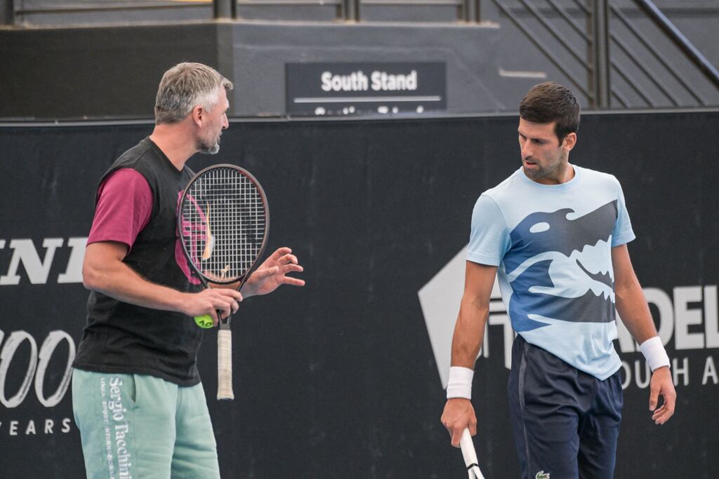 Serbian tennis player Novak Djokovic talks to his coach Goran Ivanisevic. Photograph: Brenton Edwards/AFP via Getty Images