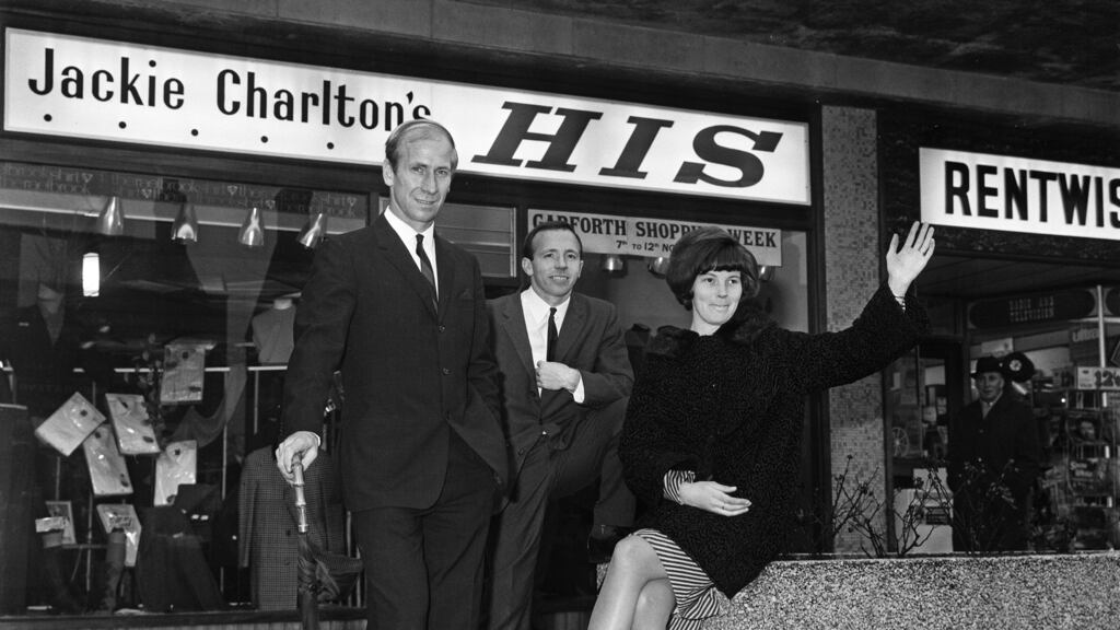 Bobby Charlton (left), Nobby Stiles and Pat Charlton (wife of Jack Charlton) at the opening of Jack’s menswear shop in Garforth, near Leeds in November 1966. Jack was unable to attend the opening so Stiles and Bobby Charlton stepped in. Photo: Dewhurst/Mirrorpix/Getty Images