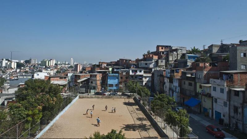Youngsters play football in the Guarani shantytown in Sao Paulo. Nelson Almeida/AFP/Getty Images