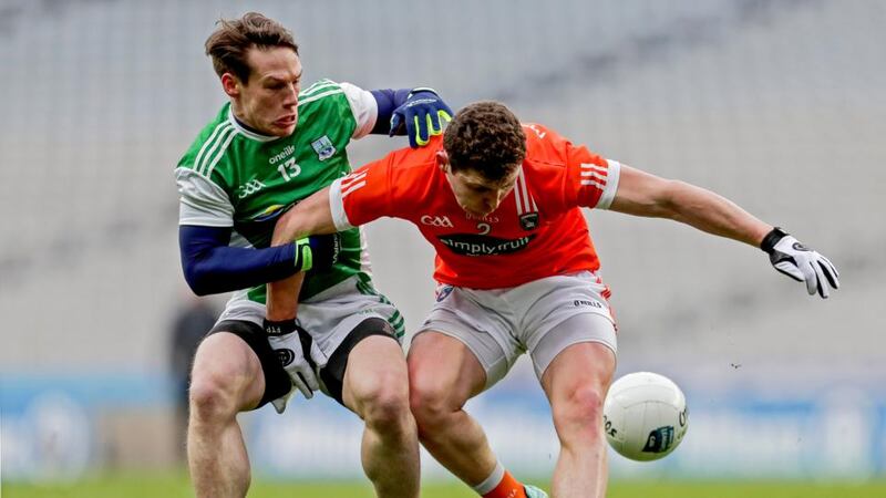 Armagh’s Patrick Burns and Tomas Corrigan of Fermanagh