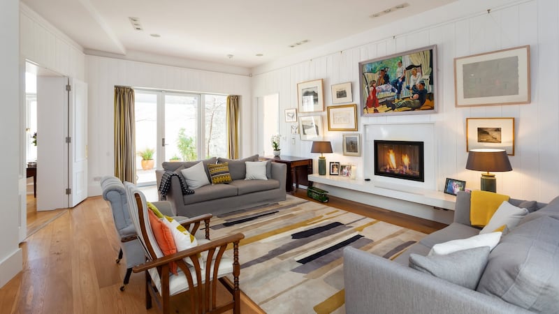 Original wood fireplaces have been replaced with fine marble ones