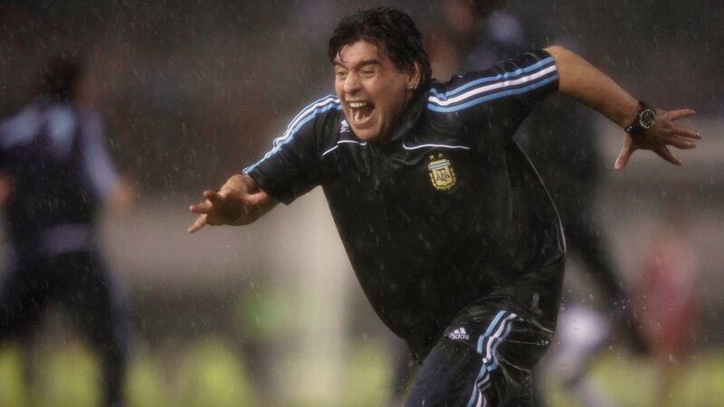 Argentina head coach Diego Maradona celebrates his team’s second goal during the World Cup 2010 qualifying match against Peru in October 2009. Photograph: Marcos Brindicci/Reuters